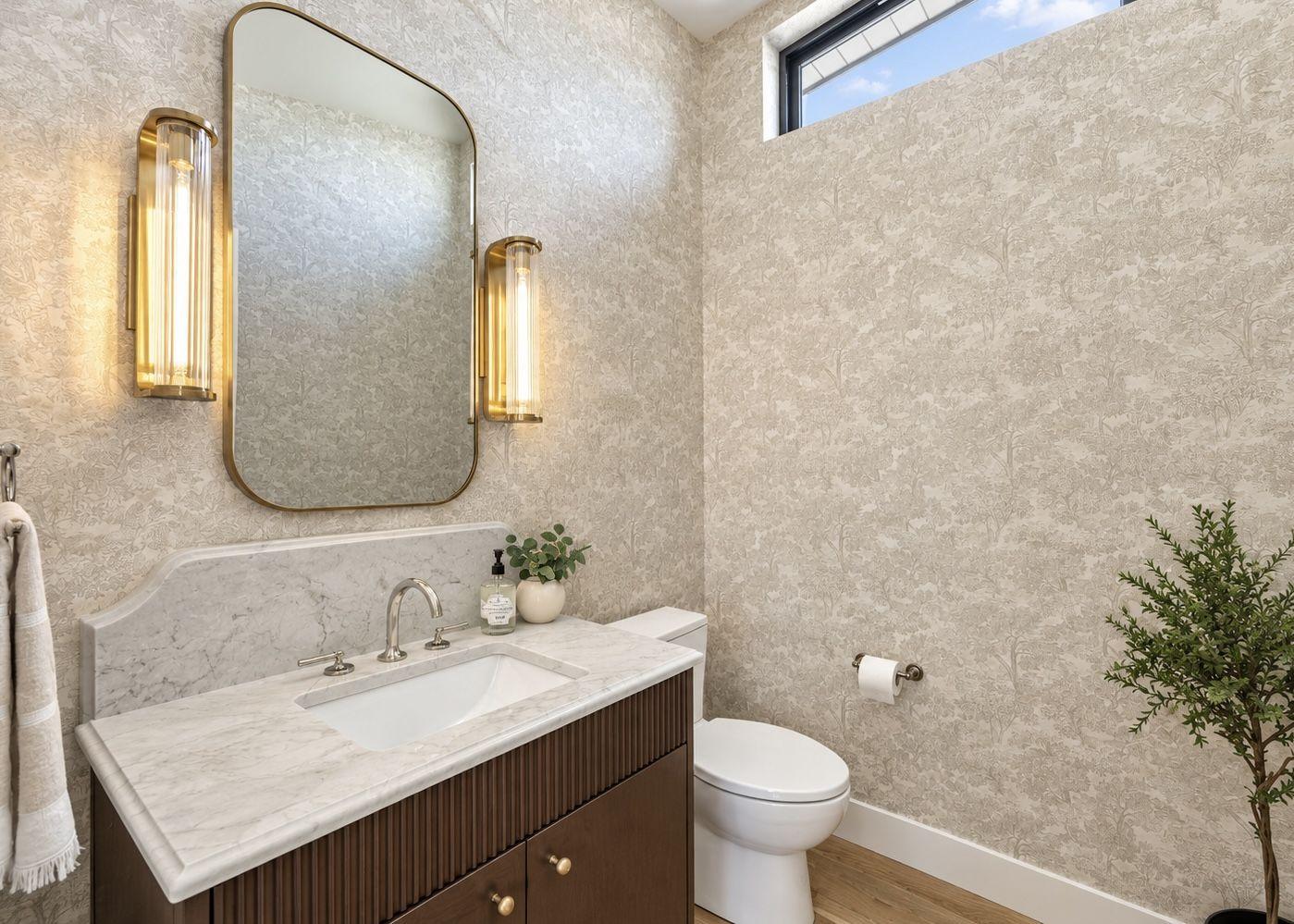 Textured wallpaper in powder bathroom