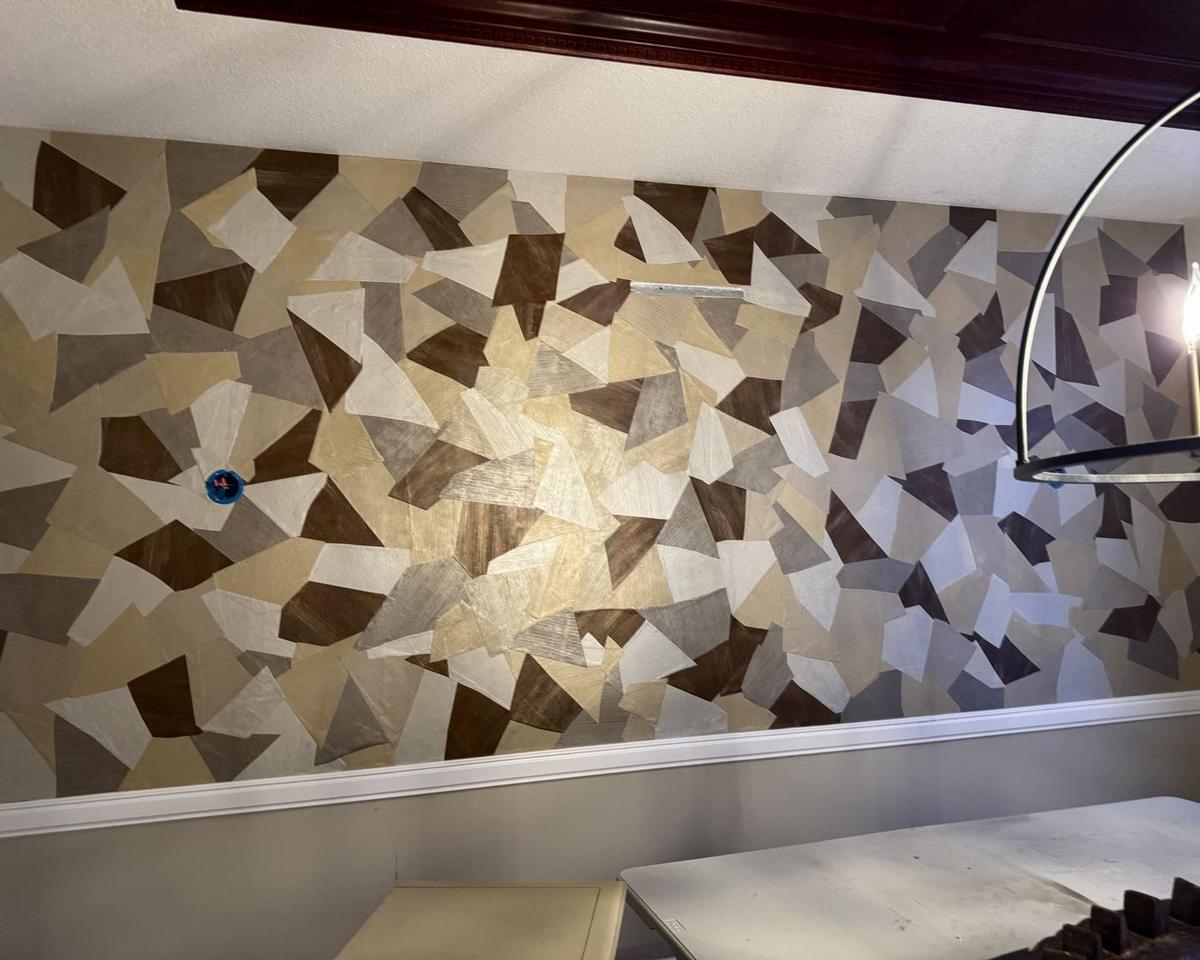Geometric faceted wallpaper mural, dining area