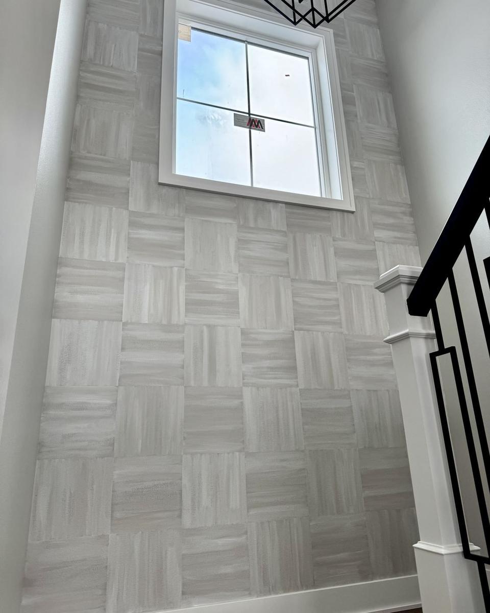 Basketweave wallpaper stairwell with window