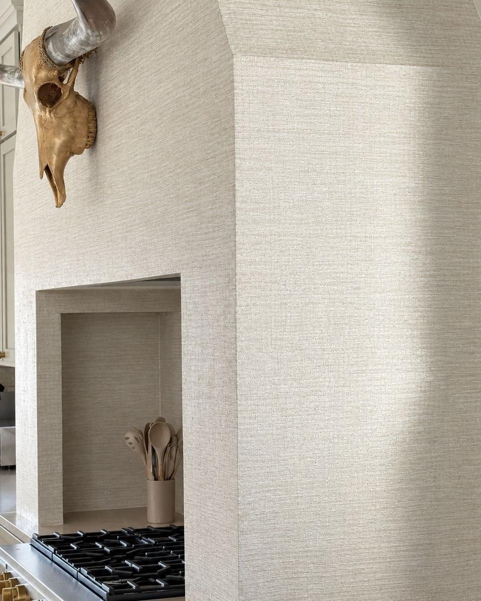 Textured linen wallpaper kitchen hood surround