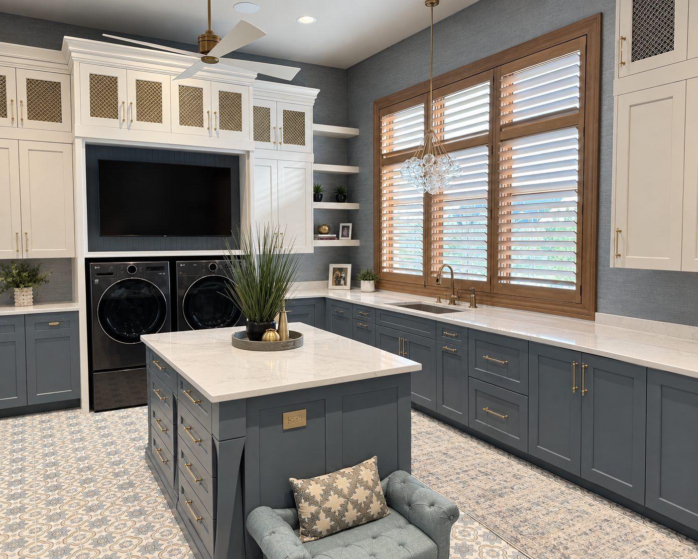 Blue-gray painted cabinetry in laundry and kitchen
